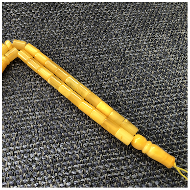 Yellow colour amber prayer beads